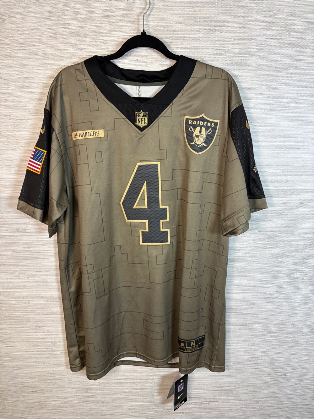 Nike Las Vegas Raiders #4 Olive Green Black Football Jersey on field Derek Carr